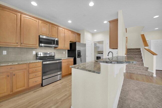 Building Photo - Modern 2-Bed, 3-Bath Home in The Village at Five Parks – Ralston Valley - AVAILABLE SEPTEMBER 1ST!!