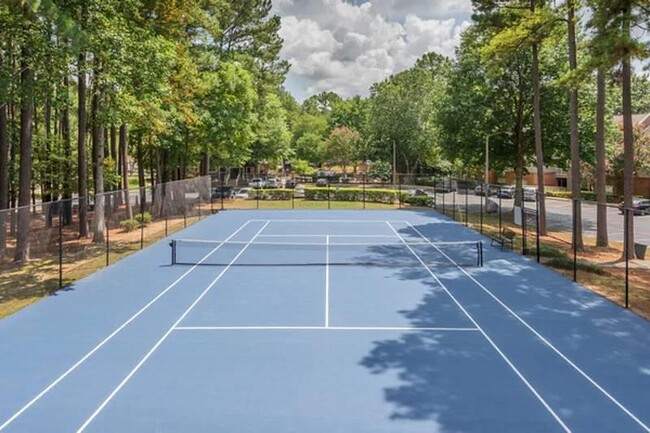 Enjoy a game of tennis or pickeball - Bridges at Chapel Hill