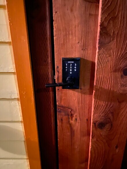 Keypad gate to back entrance - 2445 Harrington Ave