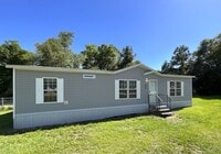 Building Photo - Beautiful 3/2 Mobile Home w/ Lawn Maintenance Included