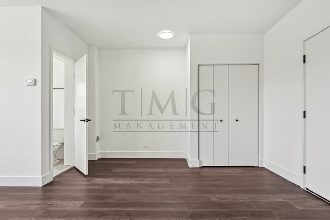 Building Photo - Sleek, Bright & Brand New — Stylish Studio...