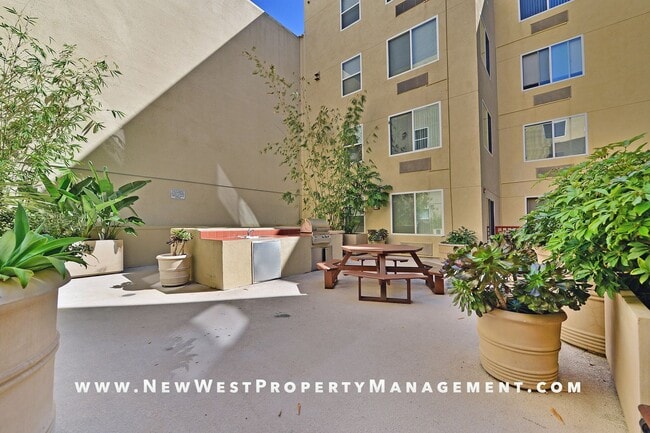 Building Photo - Charming Little Italy 1-Bedroom at Portico! Small Pet OK! Available Now!