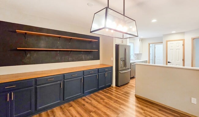 Building Photo - Updated 4-Bed Home Near Future Light Rail ...