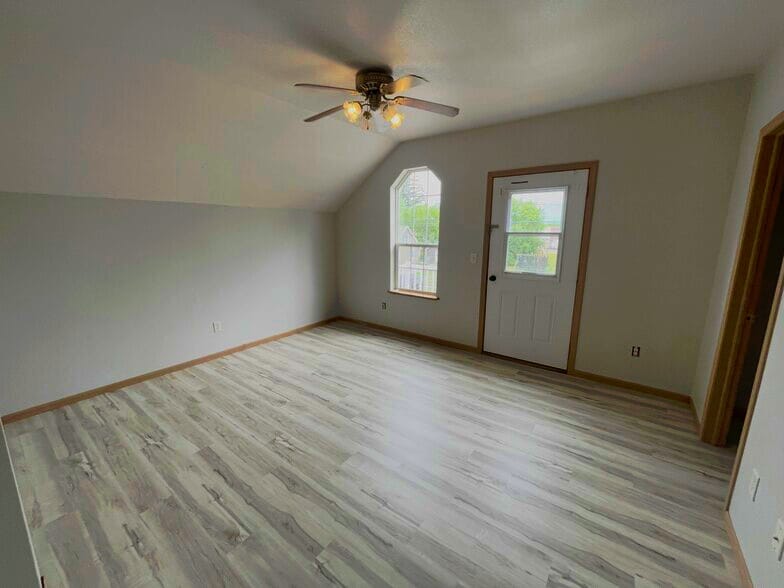 Comfortable second bedroom perfect for a guest room, home office, or additional living space. - 1016 4th Ave