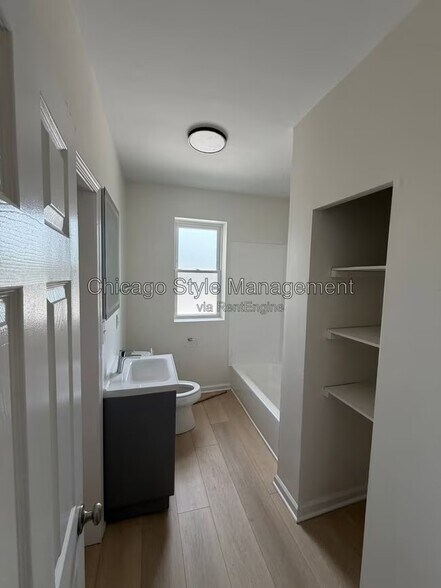 Building Photo - 7831 S Colfax Ave