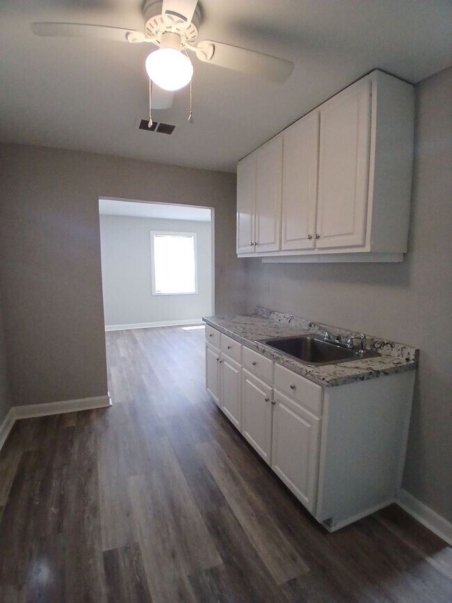 Building Photo - Renovated 3-Bedroom Gem on a Quiet Residential Street - Open To Section 8