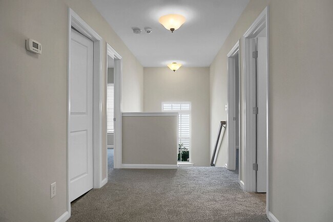 Building Photo - Comfortable Living, 4 BR 2.5 BA Home, Two Car Garage