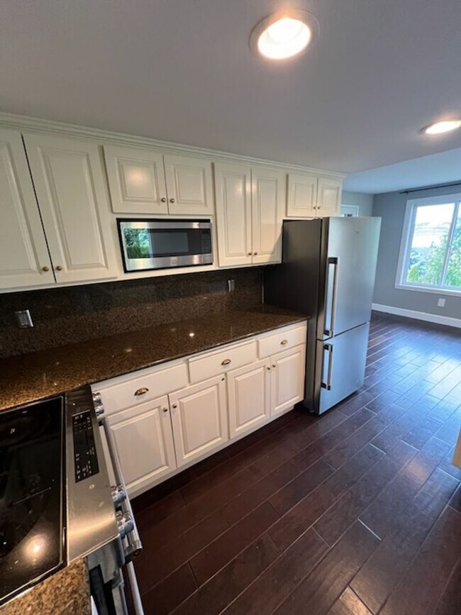 Building Photo - 1302-1304 38th Ave Ct NW
