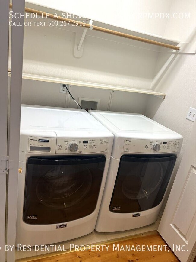 Building Photo - 6463 NW Wenmarie Dr