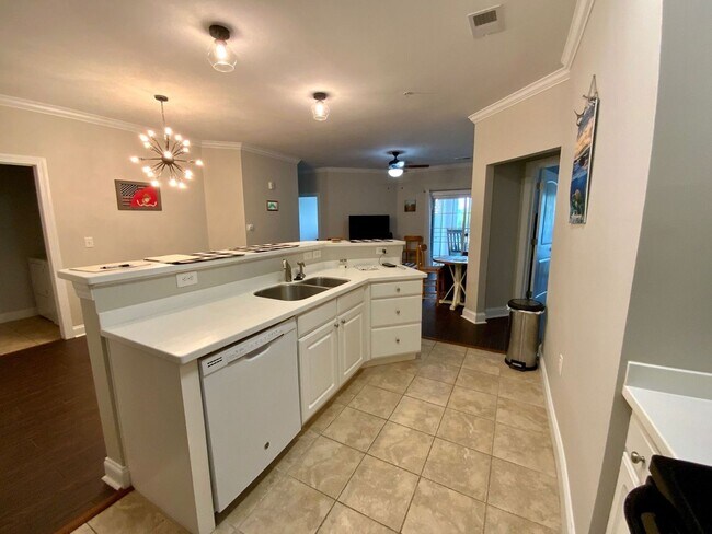 Building Photo - Furnished 3 bedroom 3 bath Condo - Flexible Term lease - Topsail Landing Community
