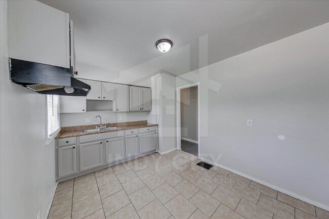 Building Photo - 6132 Raleigh Dr