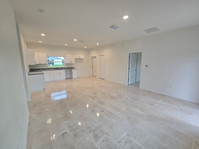 Building Photo - BRAND NEW 3/2/1 -SW LEHIGH ACRES FL