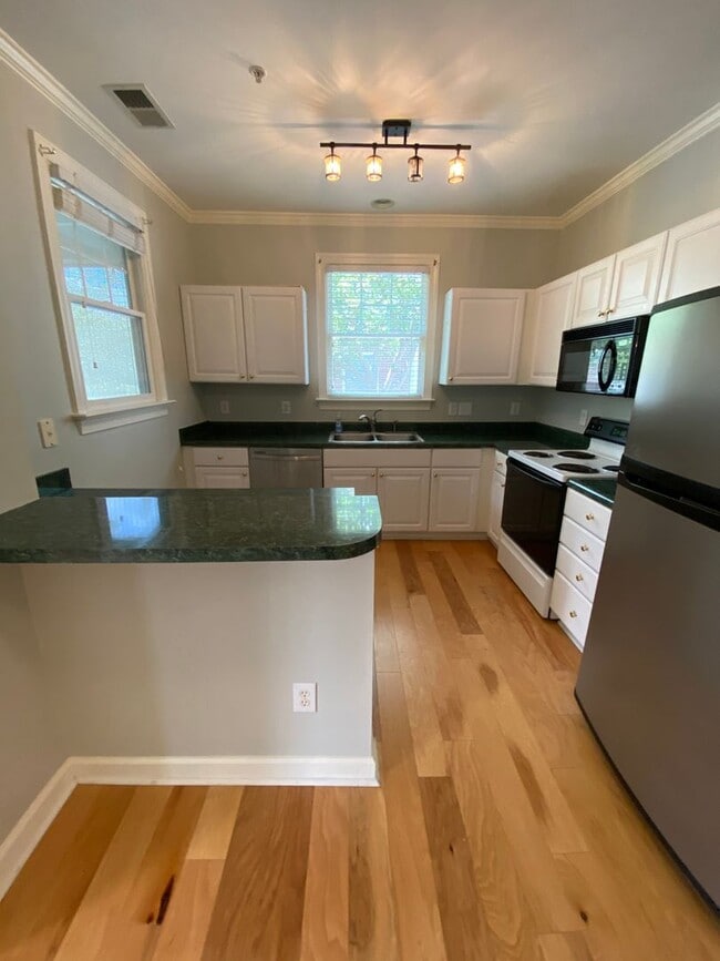 Building Photo - Spectacular Southern Village Two Bedroom Condo