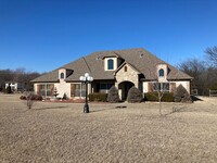 Building Photo - Gorgeous Custom 4 bedroom, 3 1/2 bath home...