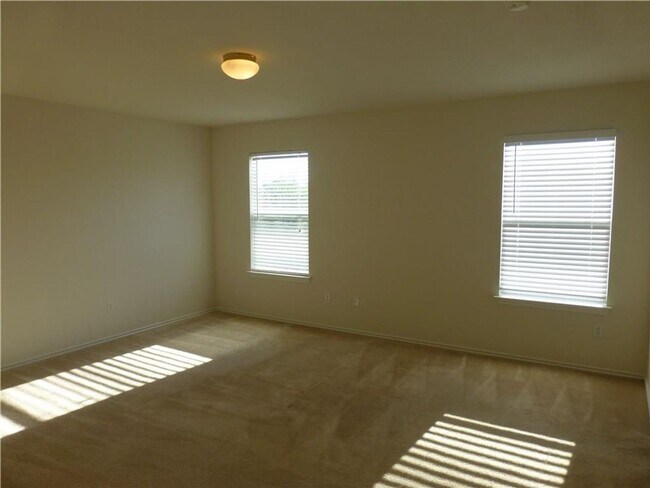 Building Photo - Generous Four Bedroom, Three Bath Home with Large Yard