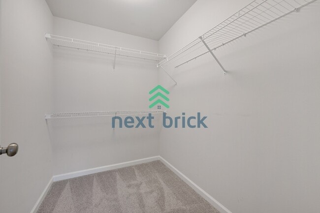 Building Photo - A Beautiful Corner Home Designed for Comfort, Light & Community!