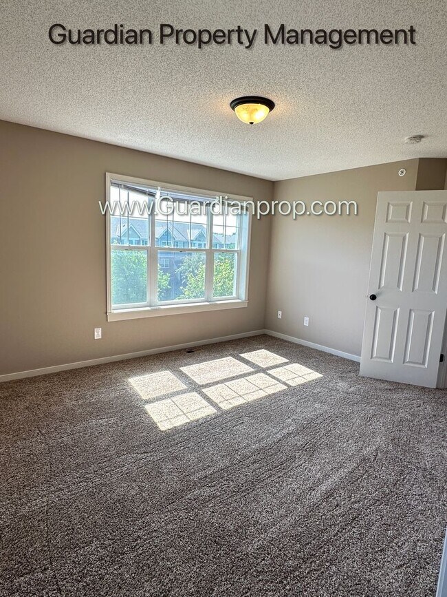 Building Photo - Champlin Corner Unit Town Home, 2 Car Garage, Dishwasher, Washer/Dryer, Balcony