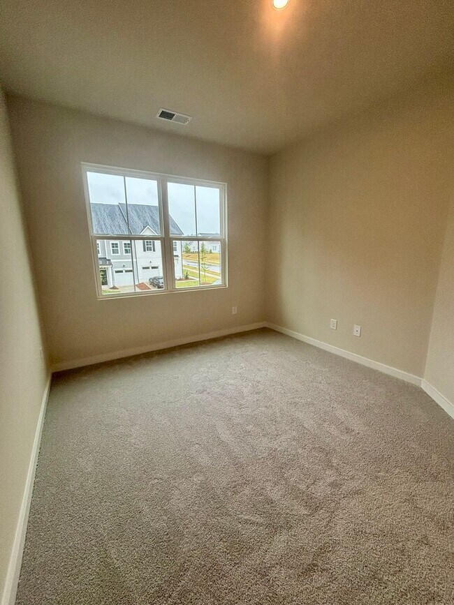 Building Photo - Beautiful, New Construction Townhouse in G...