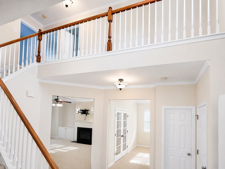 Impressive two-story foyer creating a grand and welcoming entrance. - 2143 Somerset Pl SE