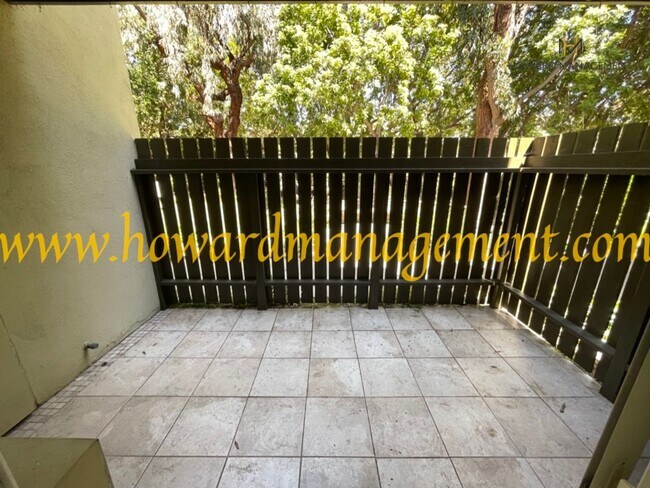Building Photo - Bonus Den! Beautiful lower condo with large patio in Tara Hills, a resort style living complex!