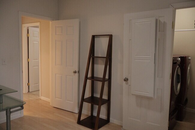 Building Photo - Expansive Mostly-Furnished Residence featuring 3 Bedrooms, a Completed Basement, and a Loft Space