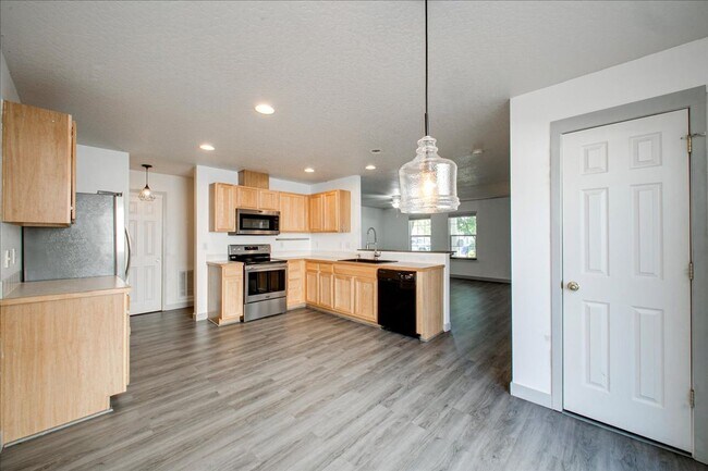 Building Photo - Low-Maintenance Comfort with Community Perks