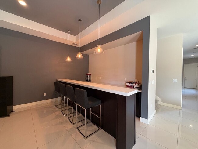 Building Photo - 4 Bed, 4.5 Bath Summerlin Home in The Ridges with Resort-Style Backyard