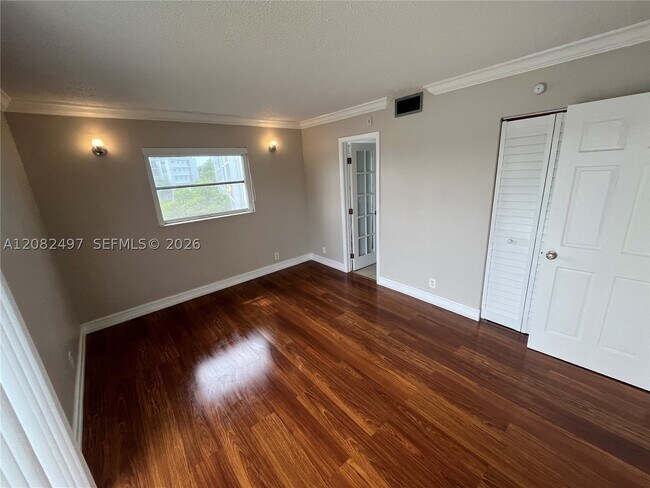 Building Photo - 8560 N Sherman Cir