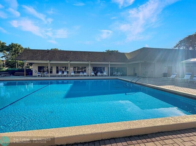 Building Photo - 6090 N Sabal Palm Blvd