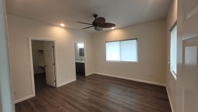 Building Photo - This 3-bedroom, 2-bath home in Orchidland Subdivision