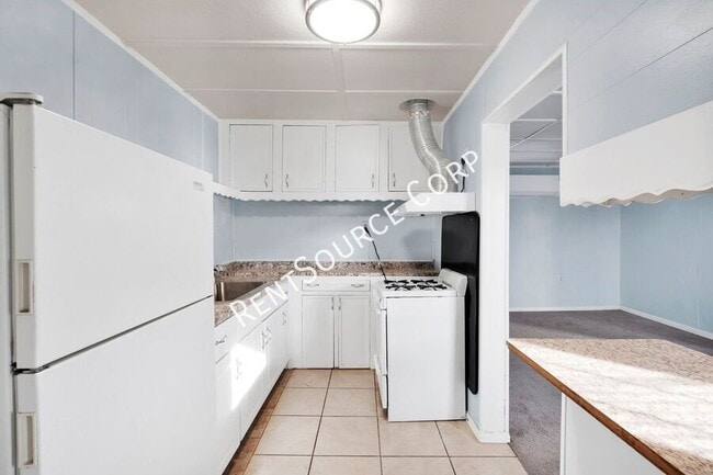 Building Photo - 1040-1042 Flora St