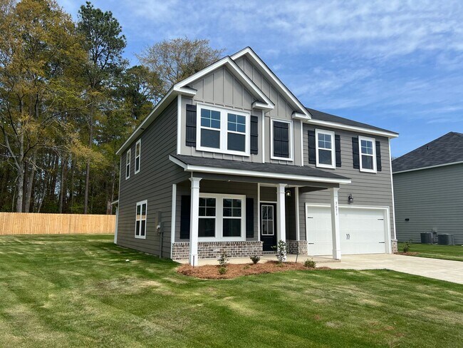 Building Photo - Exquisite Rental Home Features 4 Beds, 2.5 Baths in John's Landing!