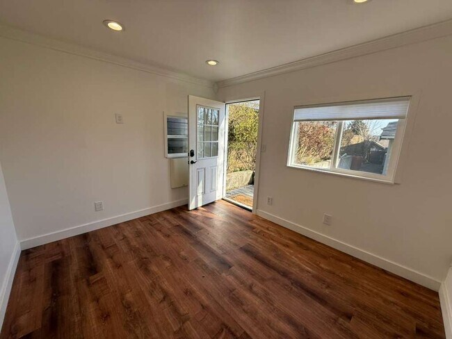 Building Photo - Two Bed 1 Bath House with Fenced Backyard!