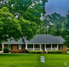 Building Photo - Beautiful Brick Ranch with basement