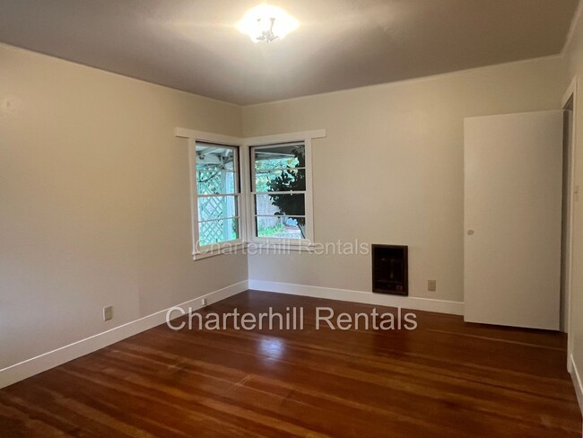 Building Photo - Spacious home with large yard convenient t...