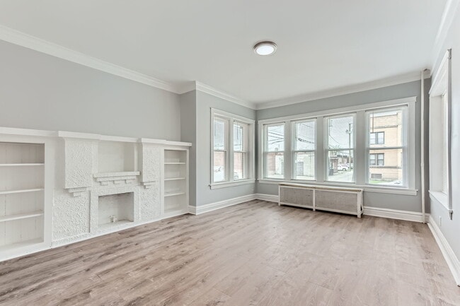 Building Photo - 7449 S Vernon Ave