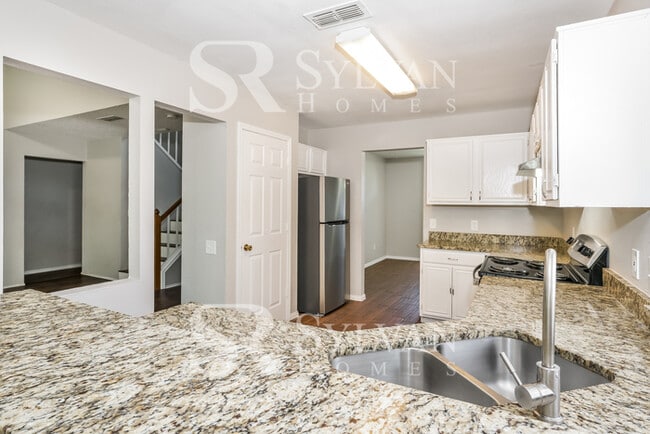 Building Photo - Turn the key. Enter. Smile. Repeat every day!