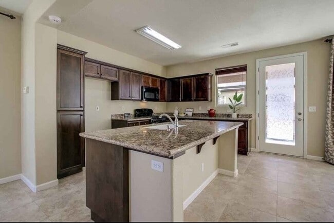Building Photo - 7479 E Giavanna Ave