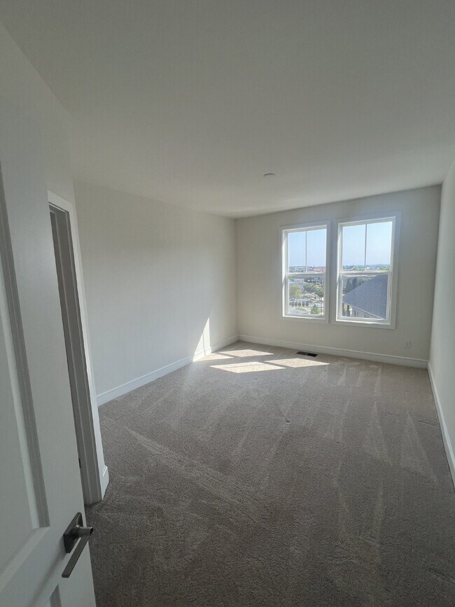 Building Photo - Brand-New Luxury 3BR Townhome-Style Condo ...