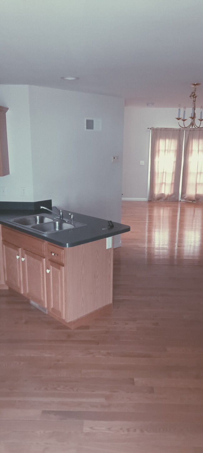 Kitchen open to living room - 602 Chatham Way