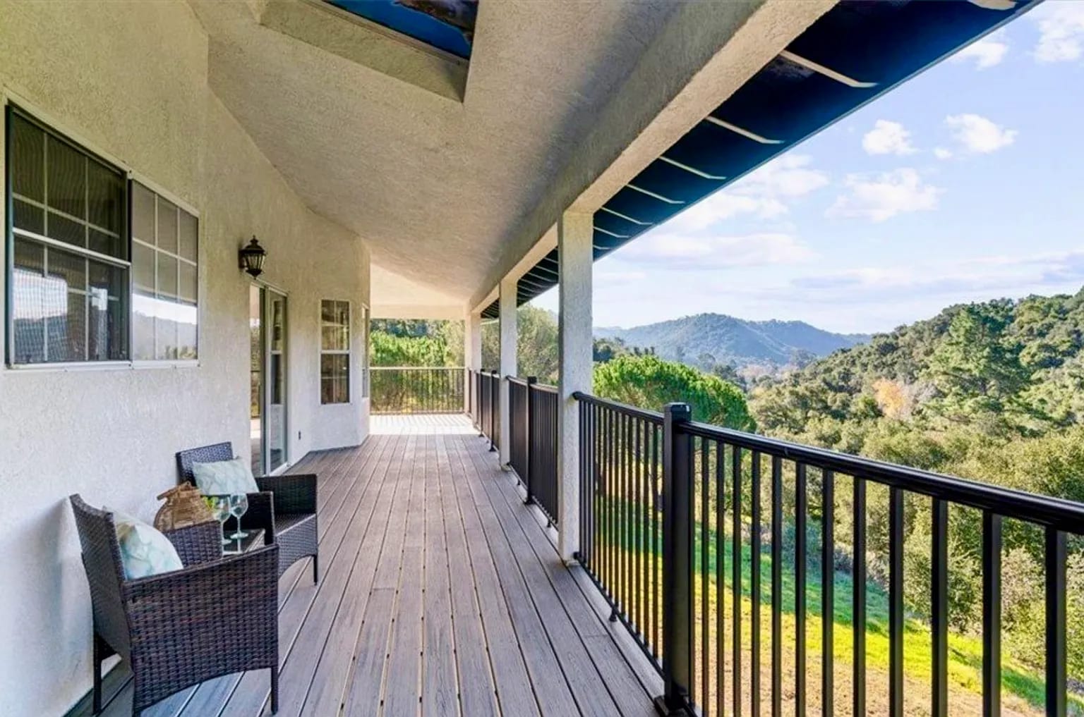 Covered wrap around porch looking out to oak studded hills. - 221 Appy Way