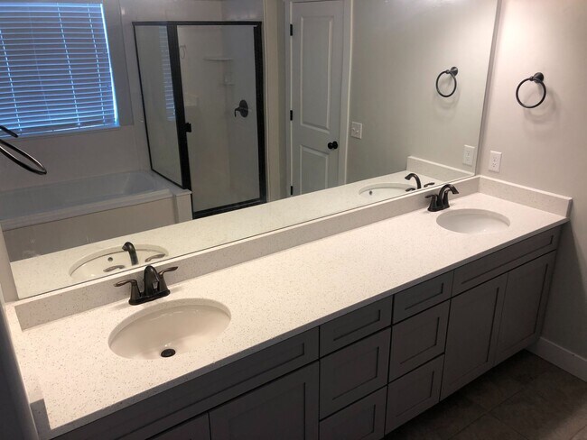 Building Photo - AMAZING HOME IN SOUGHT AFTER EXCHANGE DEVELOPMENT W/ 2 CAR GARAGE