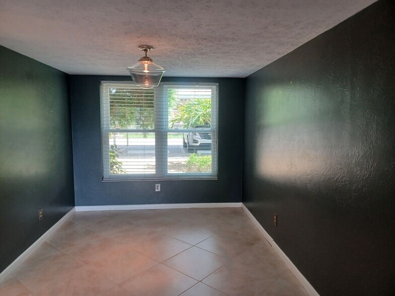 Building Photo - UPGRADED WATERFRONT END UNIT 3 BR / 2 BA Home With BOAT LIFT/ DOCK & OUTSTANDING VIEWS