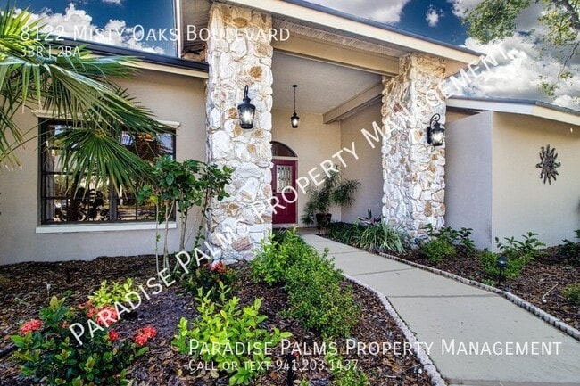 Building Photo - 8122 Misty Oaks Blvd