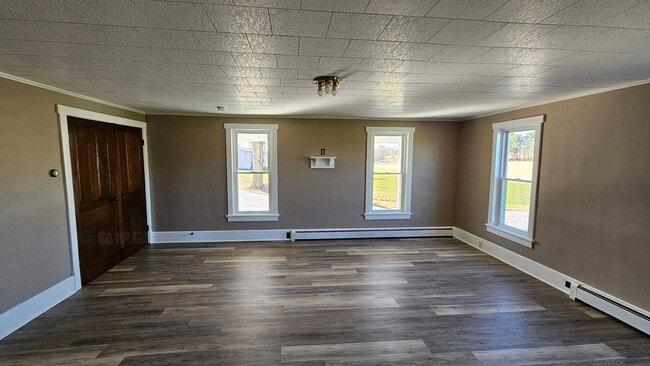 Building Photo - Country Living in This 4 Bedroom Farmhouse!