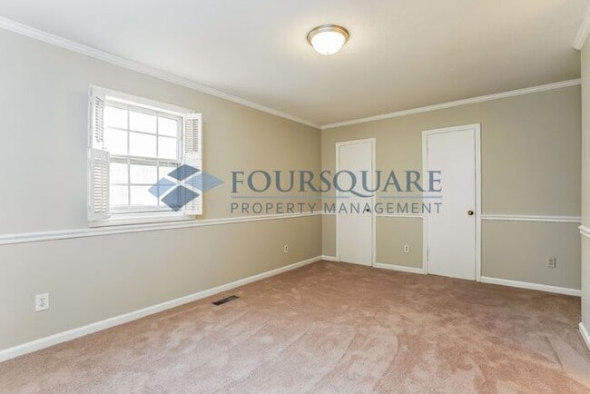 Building Photo - Spacious Townhome with Wood-Burning Fireplace, Large Deck & Storage Room , Convenient North Ridge...