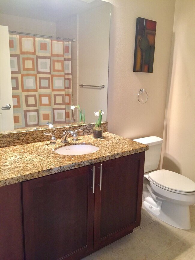 Building Photo - Beautifully Furnished Condo Right Across f...