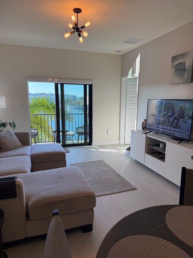 Building Photo - Premium Lake-View URBANA Residence Steps from Downtown Doral