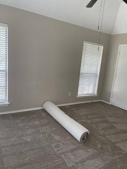 Primary bedroom (YES! that's new carpet) - 1205 W Hudgins St