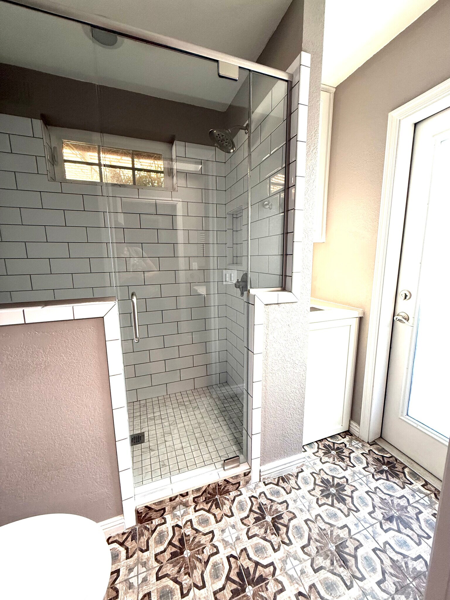 master bathroom with dual shower heads and garden access. built in laundry space - 8315 S Taylor Dr
